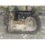 A Victorian cast iron boot scraper with D ended tray base, foliate, shell and further detail, 40
