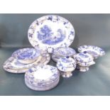 A collection of blue and white printed ware including three graduated Woods ware landscape plates