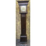 18th century oak longcase clock the trunk with full length door and lenticel, the hood with column