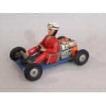 A Schuco tinplate 'Go-Kart' 1055 with clockwork motor and original key (in working order, un-boxed),