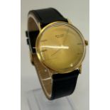 Vintage Baume gentleman's wristwatch with 18ct gold back case with presentation engraved script with