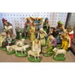 A vintage painted chalk ware Christmas Nativity set (camels neck glued) along with a stable, with