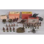 A collection of boxed and unboxed Britains model toys including a boxed General Service Limbered