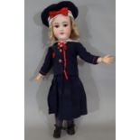 Early 20th century German bisque head doll by Armand Marseille, with closing brown eyes, open