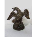 A Victorian cast iron doorstop in the form of an eagle 19cm.