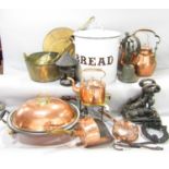 A selection of copper and brassware including a saucepan, a china tureen, horse-chestnut roaster,