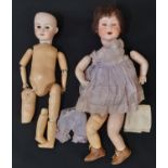 2 early 20th century bisque head dolls for restoration comprising a French doll by Lanternier marked
