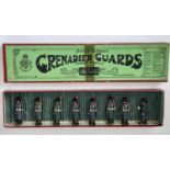 Britains set 312 (1928 version) Grenadier Guards in Greatcoats; 7 marching guards and Officer with