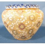 A Doulton Lambeth jardinière with repeating floral detail and pierced rim