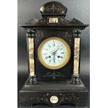 A Victorian black slate and polished marble mantle clock with painted dial, enclosing an eight day