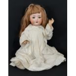 Early 20th century bisque head character doll by Ernst Heubach with blue closing eyes, open mouth