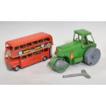 2 vintage clockwork toys by Triang 'Minic' comprising a large scale Aveling Barford Road Roller in