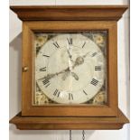 A Georgian cottage wall clock with square painted dial and thirty hour striking movement with