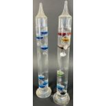 Two Galileo thermometers, both 43cm high