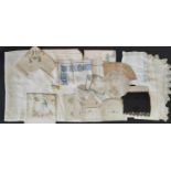 Boxful of vintage table linen mainly table cloths and decorative mats, including many with