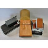 A leather clad polaroid Essex 70 Land Camera Alpha One with original leather shoulder case, together