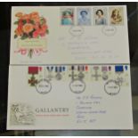 Two albums of first day covers from the mid 1960s to the early 90s, period and a card of shell