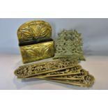 A brass arts and crafts Keswick style letter rack decorated with embossed leaves, together with