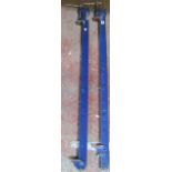 A pair of painted iron sash clamps, labelled Nutools, each measuring 123cm