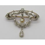 Belle Epoque diamond and pearl brooch, in yellow metal with white metal millegrain setting, three