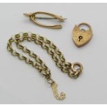 9ct bracelet, a 9ct heart padlock clasp and a yellow metal wishbone brooch, 5.2g total (3)