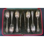 A cased set of six Harrods silver teaspoons with a sugar tong, hallmarked Harrods London, 1908, in