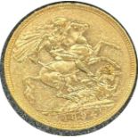 Victorian gold sovereign dated 1894, circulated, contained in a circular container