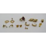 9ct garnet wishbone type ring with scrolled openwork shank, plus a quantity of 9ct earrings, 5g