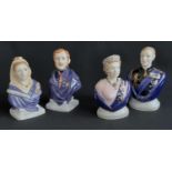 Four Royal Worcester candle-snuffers including Queen Victoria, Prince Albert, Queen Elizabeth II,