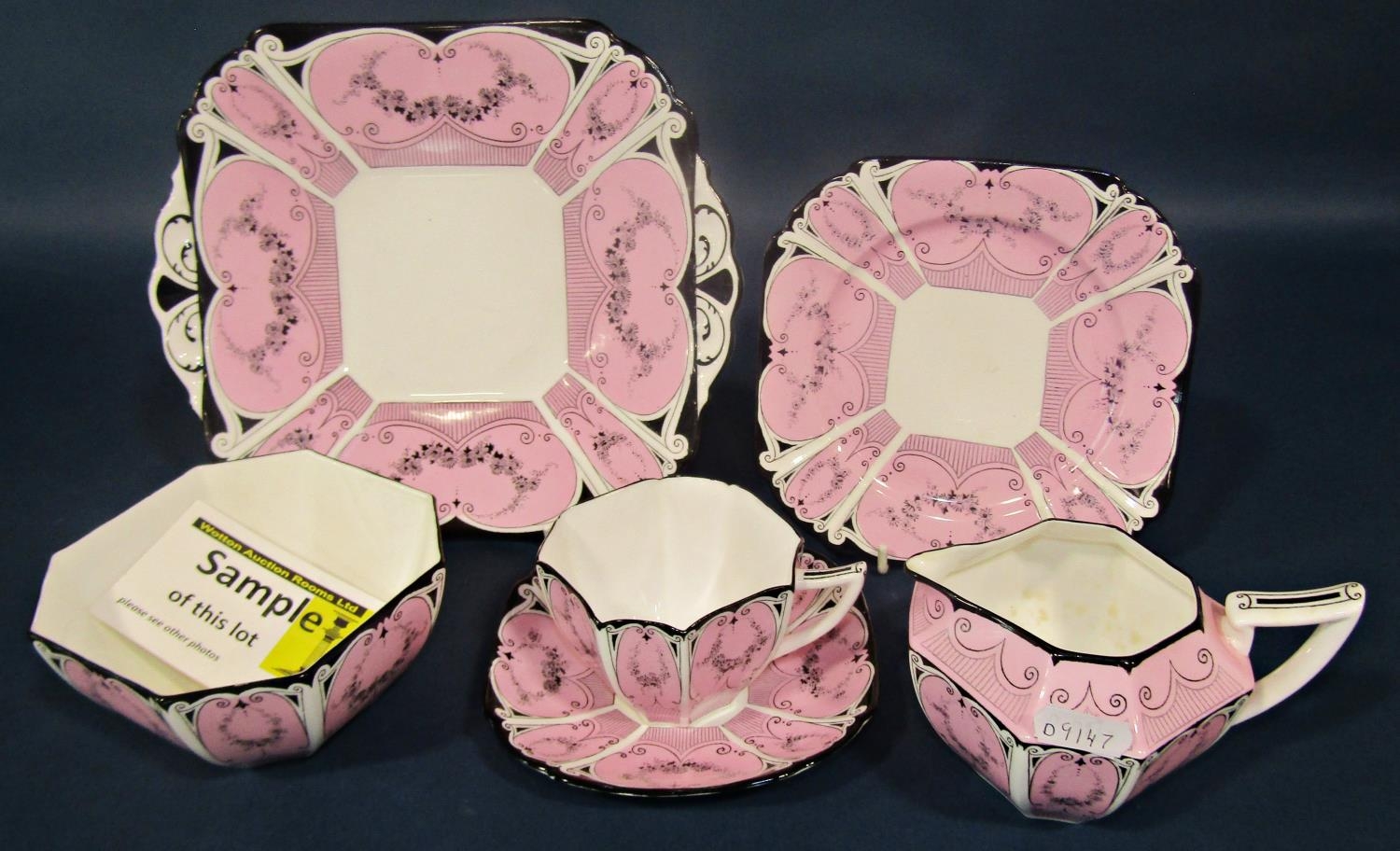 A Shelley Garland of Flowers Queen Ann shaped tea service for 12 in a pink, black and white