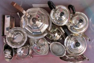 A mixed selection of silver plated tableware, including teapots, sauce boats , sugar bowls, fruit