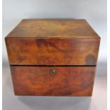 A 19th century burr walnut six division decanter travel box with six near matching cut glass