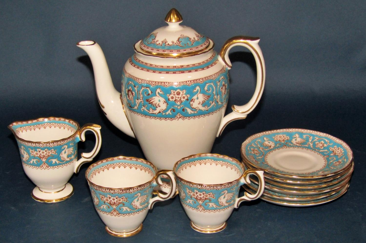 A small collection of Crown Staffordshire Ellesmere pattern coffee wares, a Crown Derby Imari cup