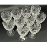 Ten Stuart type cut glass wine glasses and a single water glass (chipped af)