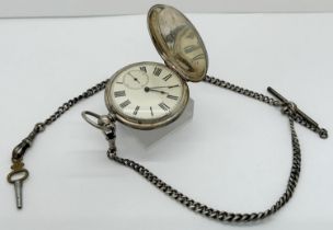 An Edwardian machine-turned white metal cased fob watch on an English silver chain (2)
