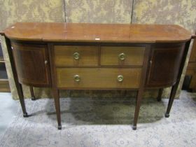 A good quality Edwardian mahogany sideboard in the Georgian style with satinwood crossbanding and