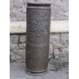 A vintage cylindrical brass umbrella/stick stand with embossed fruiting vine detail, 23cm diameter x