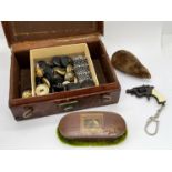 Scarab beetle, clockwork mouse, military buttons, small crocodile case, etc