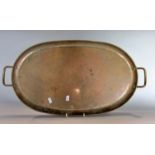 An oval hand beaten Arts & Crafts English made Olbury copper tray (see stamp to back), 64 cm max