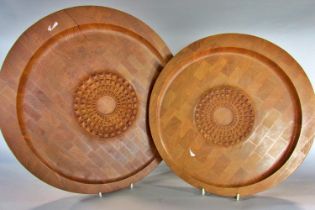 Two Digsmed of Denmark oiled teak circular wall plaques with a studded central area, stamped to