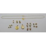 Group of 9ct jewellery to include two St Christopher charms, earrings, etc, 8.7g total