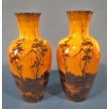 A pair of late 19th century continental oviform vases with hand painted evening landscapes, Japanese