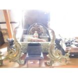 A mixed lot of items to include a pair of 19th century Rococo style scrolled andirons, a brass lined