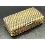 A late 18th century Russian silver gilt pill box dated Moscow 1891, 84 with all over ribbed