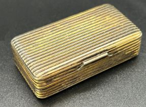 A late 18th century Russian silver gilt pill box dated Moscow 1891, 84 with all over ribbed