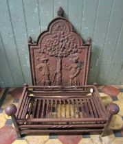 A cast iron fire back of stepped arched form with raised relief detail, 48cm wide x 72cm high,