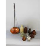 A miscellaneous collection of items to include a wooden model of a pear and a plum a child's ball on