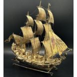 A Dutch hallmarked imported silver galleon in full sail with crew on deck, importers hallmark, Edwin