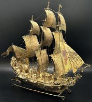 A Dutch hallmarked imported silver galleon in full sail with crew on deck, importers hallmark, Edwin