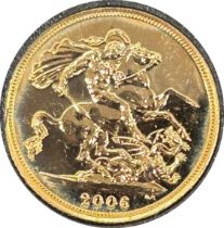 Victorian gold sovereign dated 1894, circulated, contained in a circular container